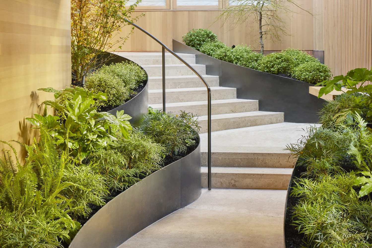 Curved steel wall for garden